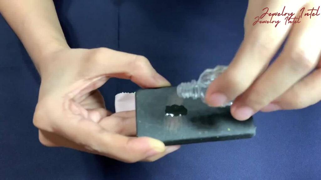 add a drop of gold testing acid