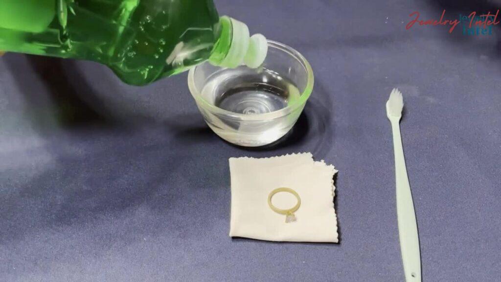 add dish soap and water