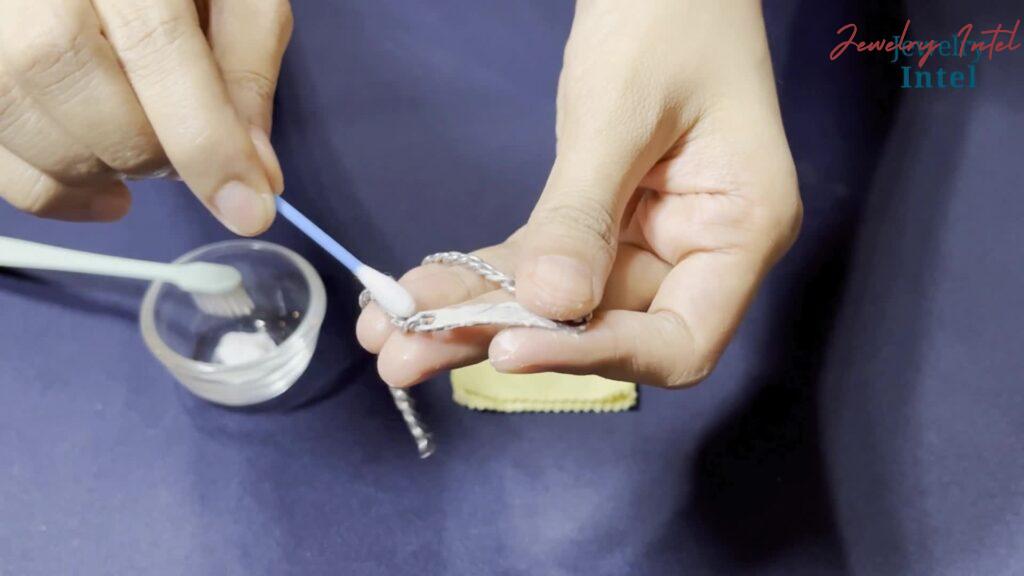 use cotton swab to clean delicate silver