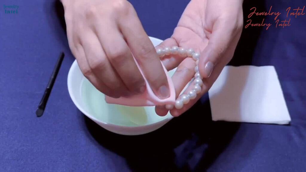 dip the cloth and wipe the pearls
