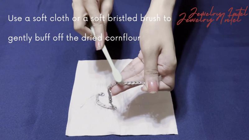 scrub silver jewelry with brush