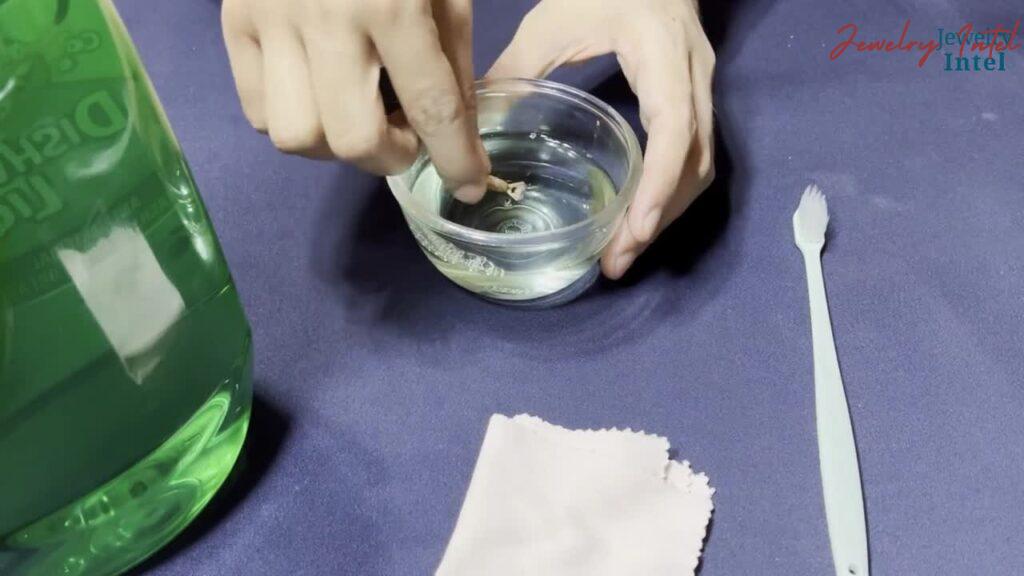 soak the diamond ring in the cleaning solution