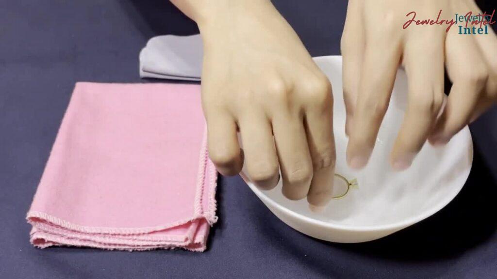 wash the diamond ring with water